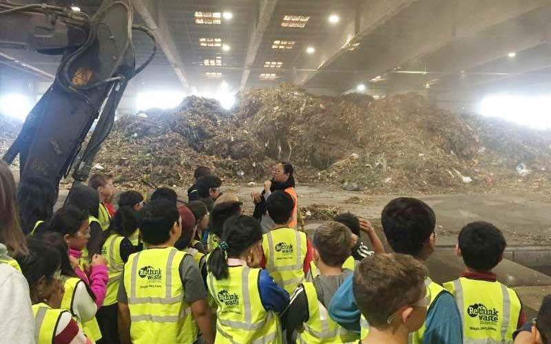 students visiting Recology green waste transfer facility