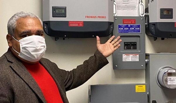 church pastor displays community resilience features such as battery backup system